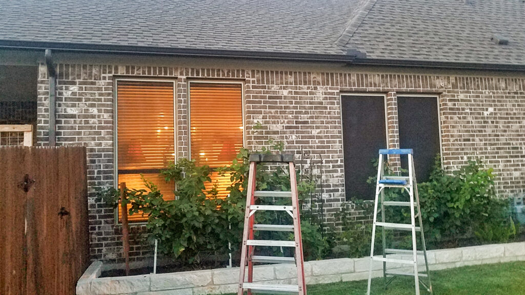Showing how solar screens do not provide evening privacy.