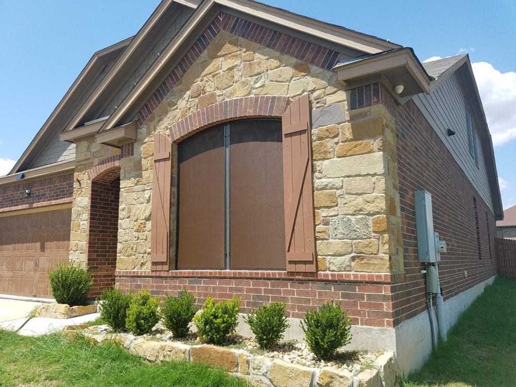 What beautiful look.  This Leander Texas  has some beautiful solar screens shading it. 