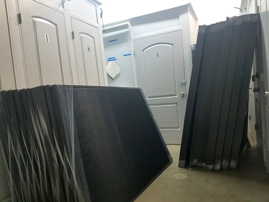 Solar screens waiting for customer pickup ordered through my local Austin TX screen & shade store website. 