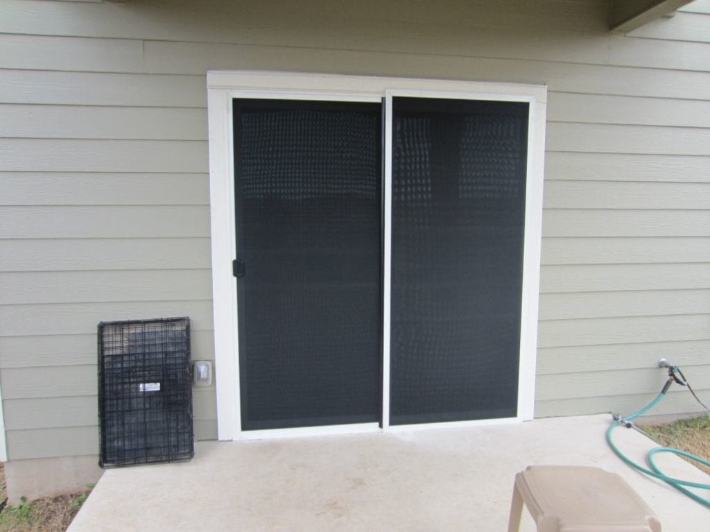 Solar screens act as exterior sun blocking blinds for sliding glass doors.